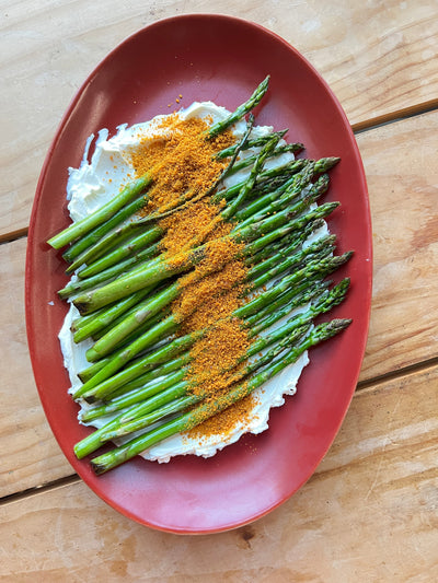 Creamy blistered asparagus with a spiced Coconut-Peanut sprinkle